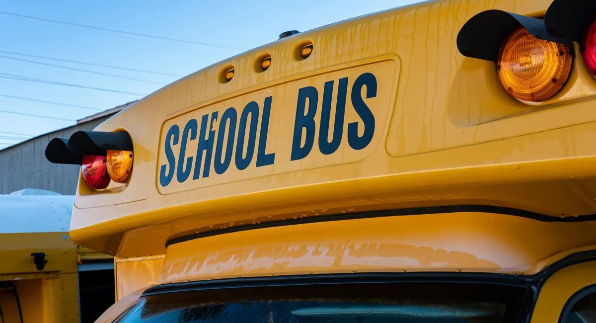Why don't school buses have seat belts?